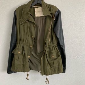 Green army jacket with faux leather sleeves